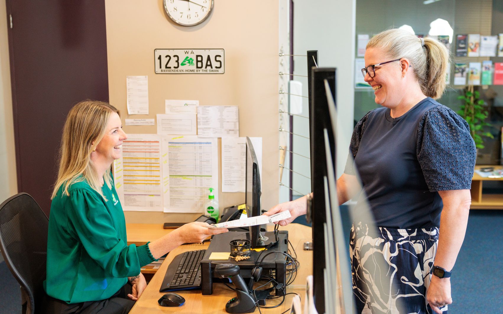 Customer service team member helping community member